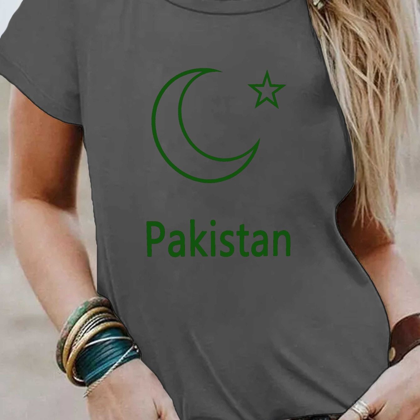 Women's Pakistani Star & Pakistan Print T-Shirt - Crescent Moon & Bold Text Design, Dark Grey with Green Lettering, Short Sleeve Crew Neck Casual Top, Breathable Medium-Stretch Fabric, Machine Washable All-Season Comfort, Cas
